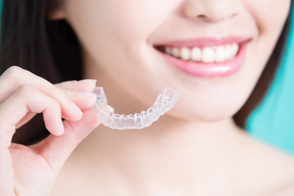 Invisalign and Oral Health: A Winning Combination